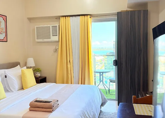 Cozy King Bed With Sofa Bed Sunvida Tower Across Sm With Balcony Apartment Cebu